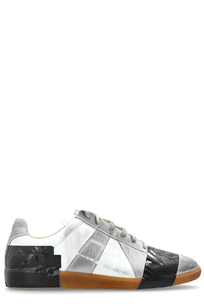 maison-margiela-vintage-effect-sports-shoes-958270736