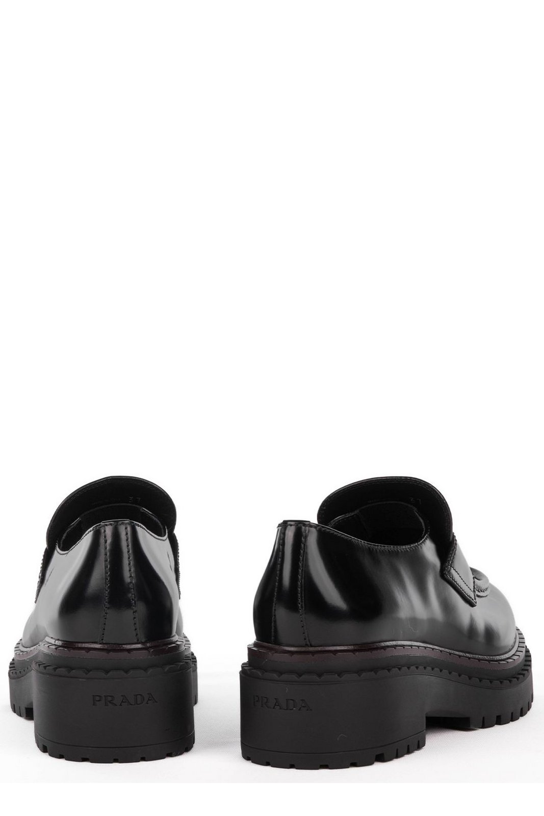 Prada Logo Plaque Round Toe Loafers